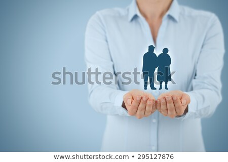 Foto stock: Welfare Officer With Senior Woman