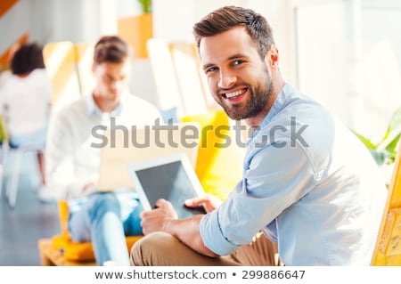 ストックフォト: Man Holding A Digital Tablet