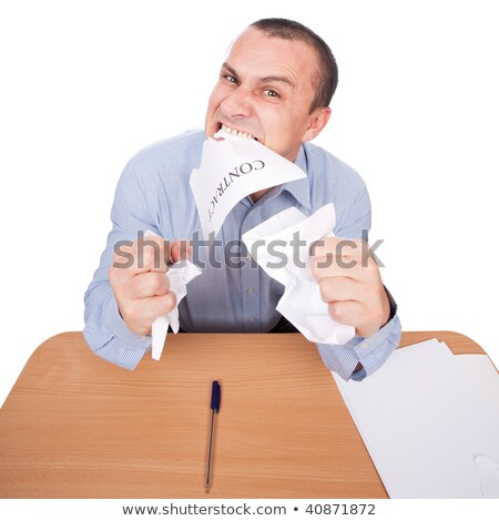 Zdjęcia stock: Furious Young Man Tearing Up The Background