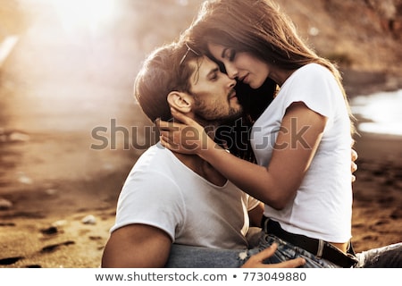 Stock fotó: Young Man And Woman Kissing