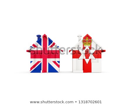 Zdjęcia stock: Two Houses With Flags Of United Kingdom And Northern Ireland