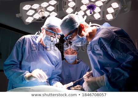 Сток-фото: Asian Surgeons Performing Surgery