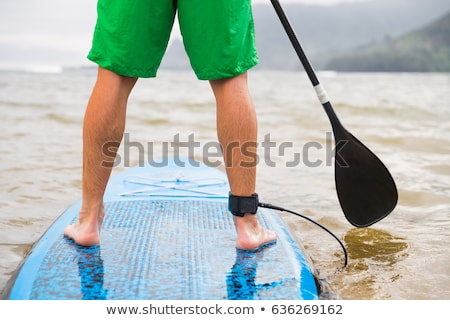 Paddleboard Man Paddling On Sup Stand Up Paddle Board On Lake Closeup Of Feet And Legs Stockfoto © Maridav