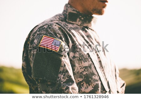 [[stock_photo]]: Armed Soldiers And Flag