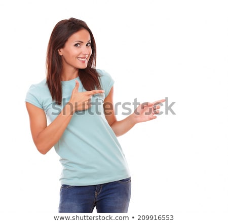 Stok fotoğraf: Smiling Young Woman Looking At You Pointing Left