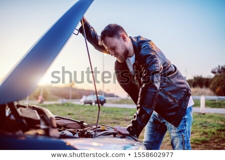 Stockfoto: Young Handsome Man In A Hood