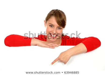 Stock fotó: Woman Pointing Finger On Blank Board