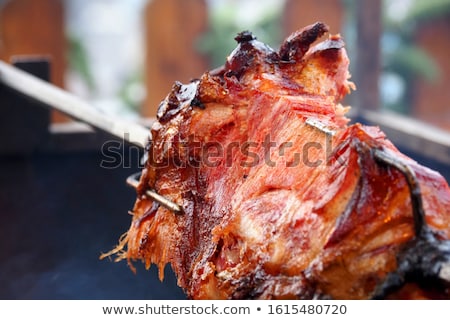 Foto stock: Pig Roasted On A Spit