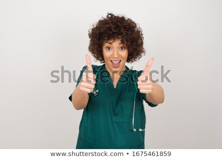 ストックフォト: Girl Standing And Giving Thumbs Up With Two Hands