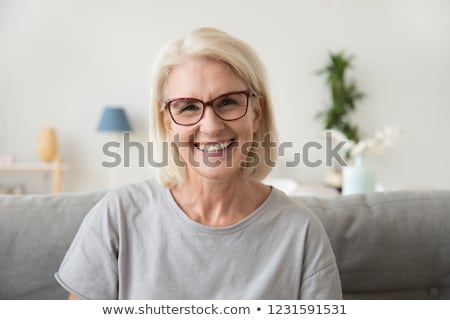 Сток-фото: Portrait Of Middle Age Woman In The Room