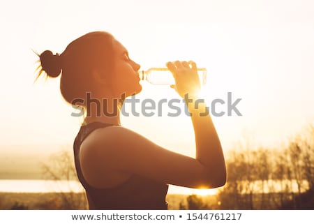 Stok fotoğraf: Jogger Drinking Water