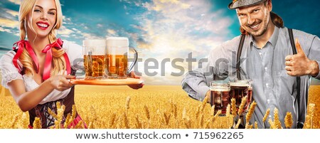 Stok fotoğraf: German Man And Two Women In National Traditional Clothes Beer Festival Oktoberfest
