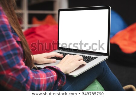 ストックフォト: Top View Of Smiling Young Woman Using Laptop