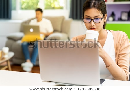 Stock fotó: Indian Delivery Man With Food And Drinks At Office