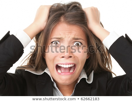 Stock fotó: Young Woman Looking Frustrated And Pulling Her Hair