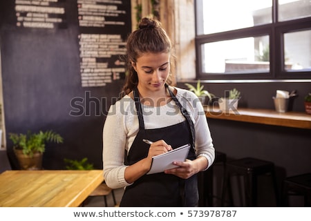 ストックフォト: Pretty Waitress Taking An Order