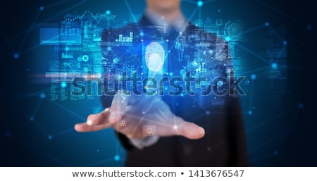 Stockfoto: Man Accessing Hologram With Fingerprint