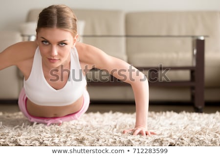ストックフォト: Young Woman Doing Plank Exercise Working On Abdominal Muscles An