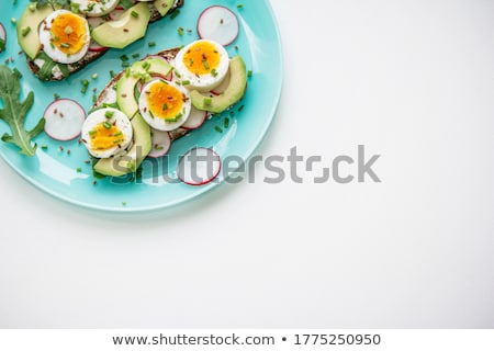 ストックフォト: Sandwich With Fresh Avocado And Onion On A Plate