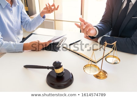 Foto stock: Legal Counsel Presents To The Client Negotiating A Contract Seri