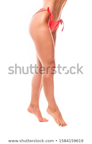 [[stock_photo]]: Female Legs And Bottom In Black Bikini Panties