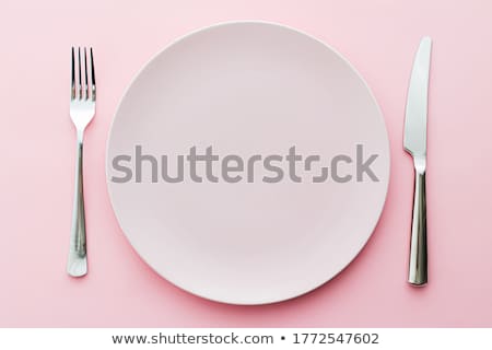 Foto d'archivio: Empty Plate And Cutlery As Mockup Set On Pink Background Top Tableware For Chef Table Decor And Men