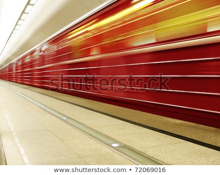 Stock photo: Fast Moving Train With Red Stripe