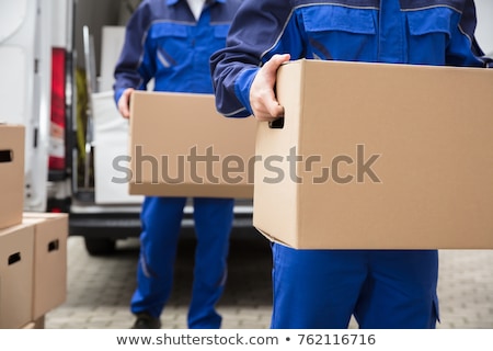 Foto d'archivio: Man With Moving Boxes