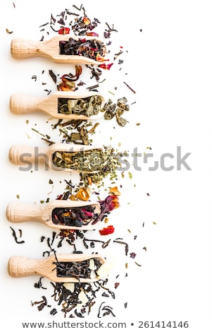 Stockfoto: Loose Camomile Tea On White