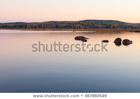 Stock fotó: Serene Lake Scenery At Dusk In Finland