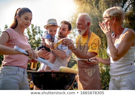 Сток-фото: Family Having A Picnic In The Garden