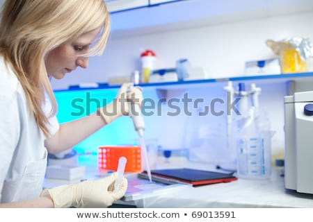 Stock photo: Portrait Of A Female Researcher Doing Research In A Lab