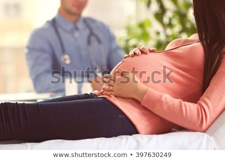 [[stock_photo]]: Pregnant Woman Preparing For Childbirth