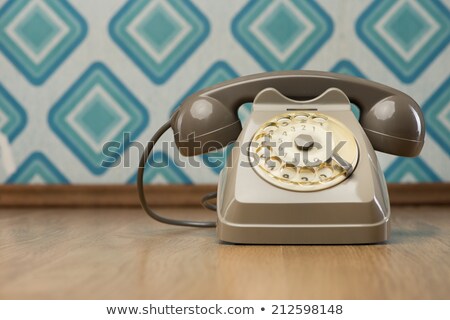 Foto stock: Vintage Telephone On Diamond Wallpaper