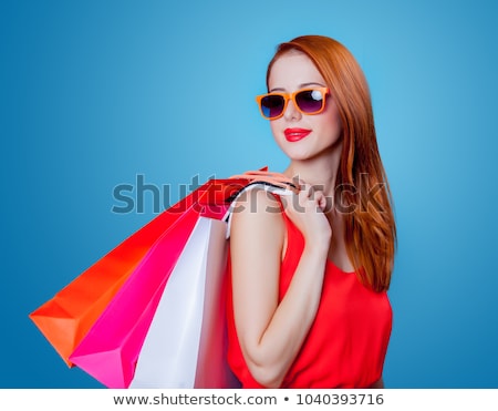 Stock fotó: Style Redhead Girl With Sunglasses And Shopping Bags