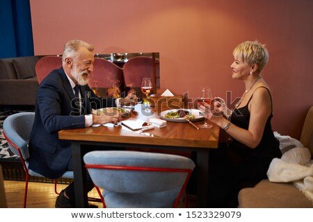 Foto stock: Relaxed Elegant Man In Tuxedo Is Laughing