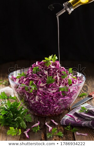 Stok fotoğraf: Chopped Parsley Is Poured Into A Bowl