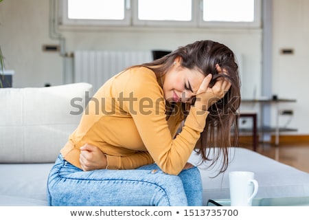 Woman With Hands Holding Pressing Her Crotch Lower Abdomen Zdjęcia stock © Photoroyalty