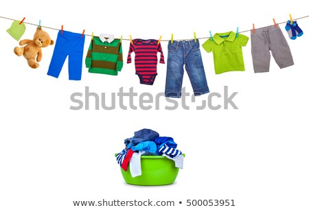 Foto stock: Socks Drying On Clothesline Isolated On White