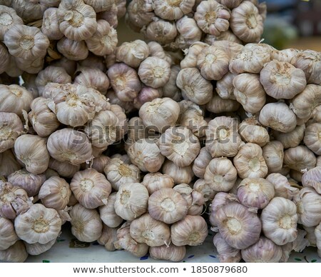 Stock foto: Heap Of Garlic Cloves On Display At The Market