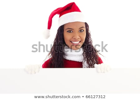 Young African Woman In Santa Claus Hat Holding Sign Stock photo © iodrakon