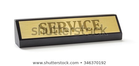 [[stock_photo]]: A Name Plate On A White Background With The Engraving Service
