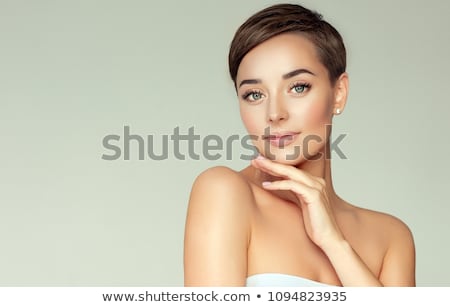 Stock photo: Portrait Of Happy Beautiful Young Woman With Short Hair