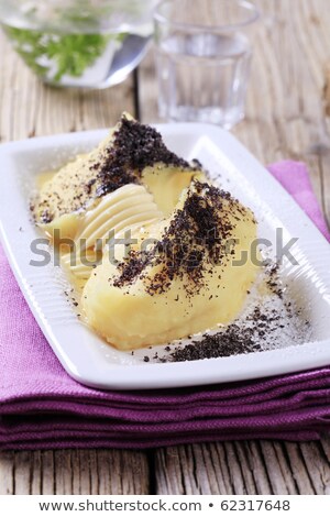 Stok fotoğraf: Lumps Of Potato Puree With Poppyseed And Sugar