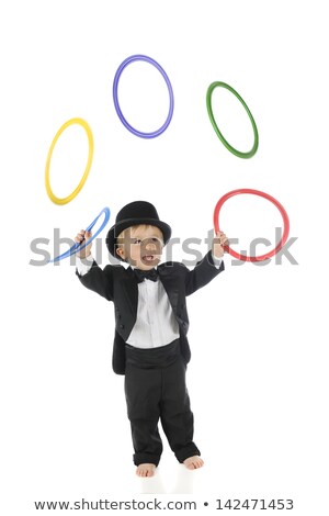 Stok fotoğraf: A Boy Juggling On White Background