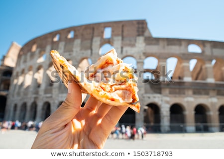 Zdjęcia stock: Woman Eating Italian Pizza Near Colosseum