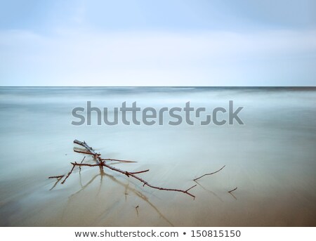 Stock fotó: Long Exposure Photography Horizon Line Soft Sea And Blue Sky