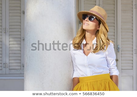 Stock photo: Blonde Woman Wearing Sunglasses