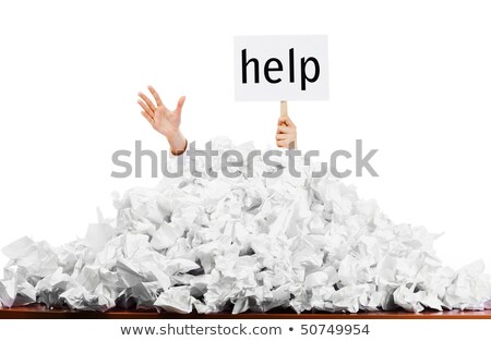 Stock photo: Person Under Pile Of Crumpled Paper