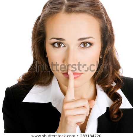 Foto d'archivio: Businesswoman Showing Finger Over Lips Be Quiet